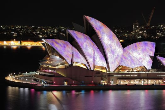 YDNEY, NSW, AUSTRALIA - JUNE 6, 2014;  Iconic Sydney Opera House in vibrant colourful imagery during Vivid Sydney annual festival event.
