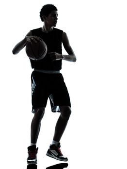 one young man basketball player silhouette in studio isolated on white background