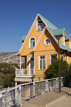 Colourfully painted house on a lookout in the hills above the harbour in the UNESCO World Heritage City of Valparaiso in Chile.