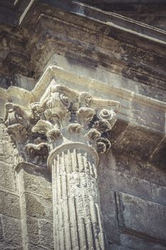 Classic, Corinthian capitals, stone columns in old building in Spain