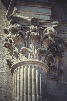 Corinthian capitals, stone columns in old building in Spain