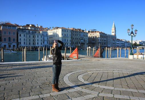Girl taking photo in Venice,Italy