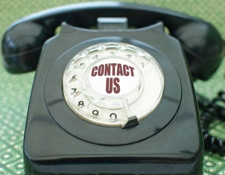 Old black vintage telephone close up