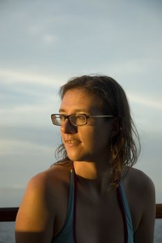 An attractive woman enjoying the sun shine in the tropics