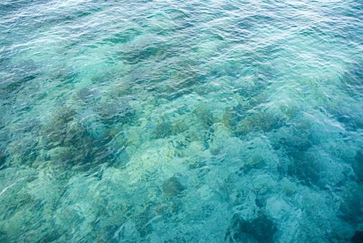 A scene displaying the tropical water found in Mabul, Borneo