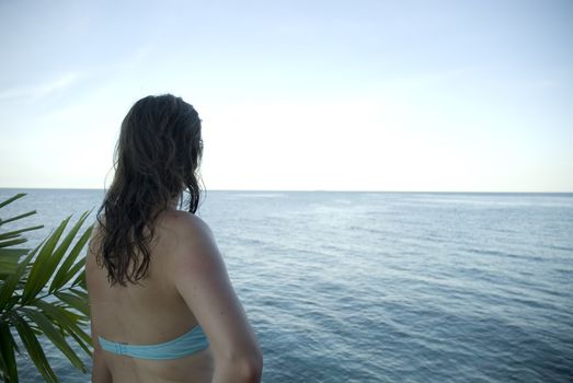 An attractive woman enjoying the sun shine in the tropics