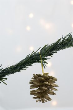 Christmas Decorations against a background lit with christmas lights