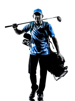 one man golfer golfing golf bag walking in silhouette studio isolated on white background
