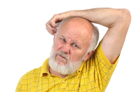 balding senior man skratching his ear using opposite hand