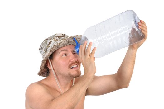 young bearded man looking into empty plastic bottle