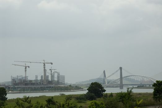 A City Skyline showing construction near bridges