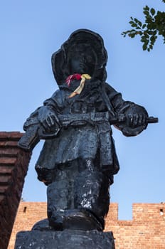 Monument of the little insurgent in Warsaw Old Town, Poland.