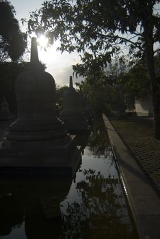Long shadows over a Stupa in a temple