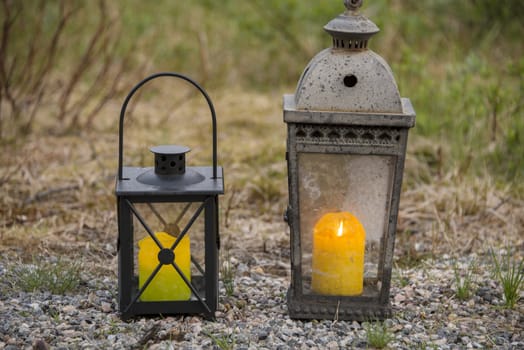 Old rustic lamps with candles