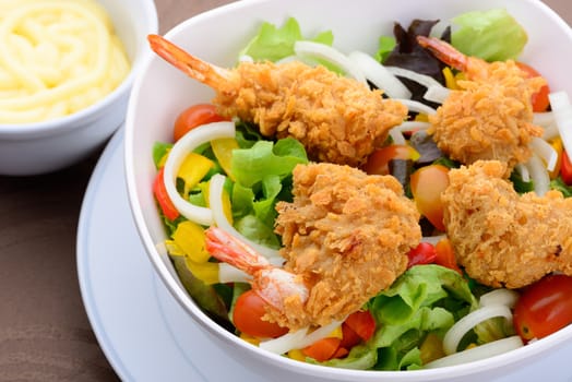 the fresh Fried shrimp salad for breakfast in white bowl