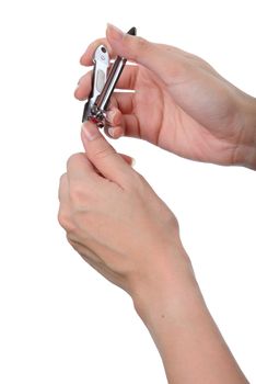 woman hand manicure with nail clipper isolated on white background