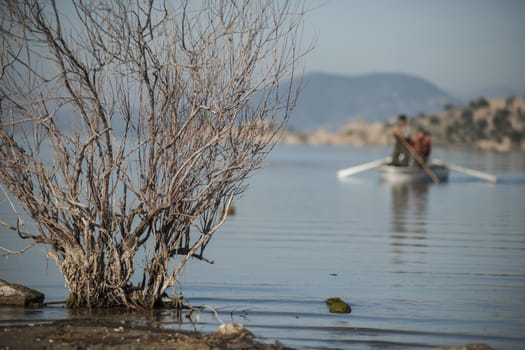 Lake Bafa Nature Park in Turkey, near Aegean Sea. Ancient Greek city Heraclea ruins can be seen all around the lake. 