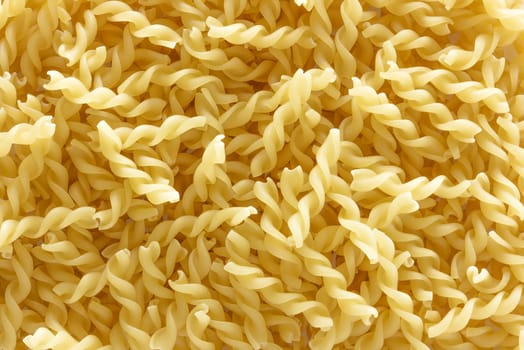 Closeup pasta texture background.  staple food of traditional Italian cuisine.
