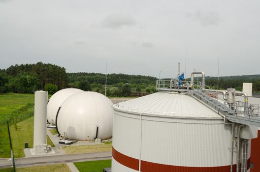 Modern biogas plant using water treatment facility sludge as renewable form of energy process.