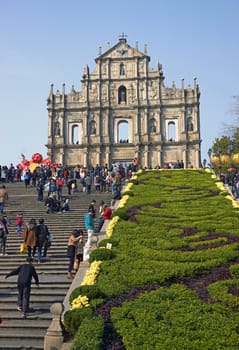 Climbing steps to the ruined facade of St Paul's Church in Macau, China