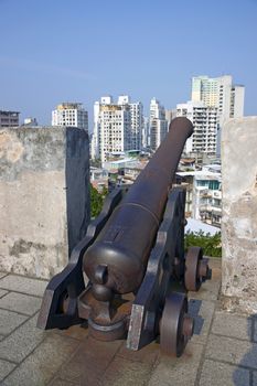 Cannon guarding the battlements of ancient Monte Fort in Macau, China
