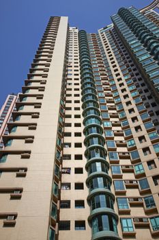 Tall residential tower block in the city of Hong Kong, China