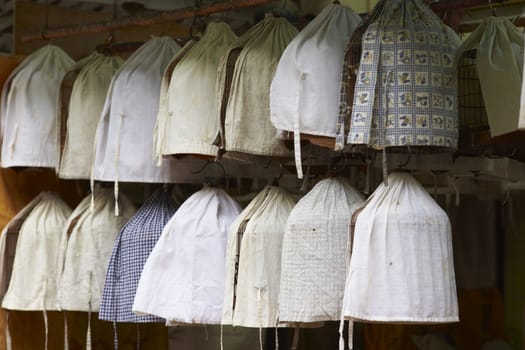 Covered bird cages in the Yuen Po Street Bird Garden in Kowloon, Hong Kong.