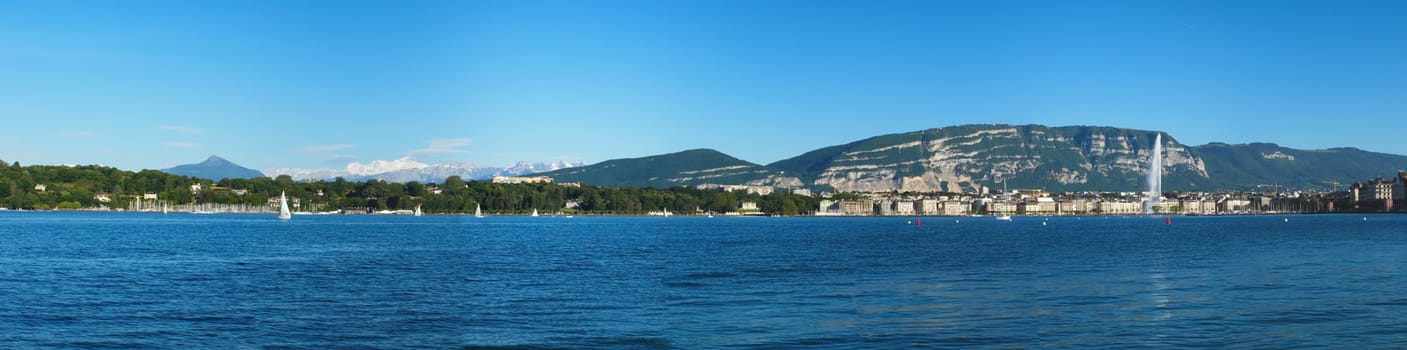 Panoramic view of Geneva area with the fountain, lake, Saleva and Alps mountains (Mont-Blanc) by beautiful day, Switzerland