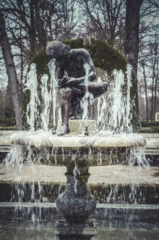 mythological bronze sculpture. Ornamental fountains of the Palace of Aranjuez, Madrid, Spain