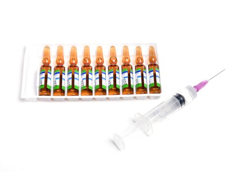 ampule and syringe and on white table