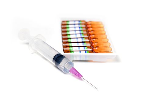 ampule and syringe and on white table