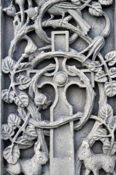 Historical religious engravings dating from the Medieval ages on a memorial.