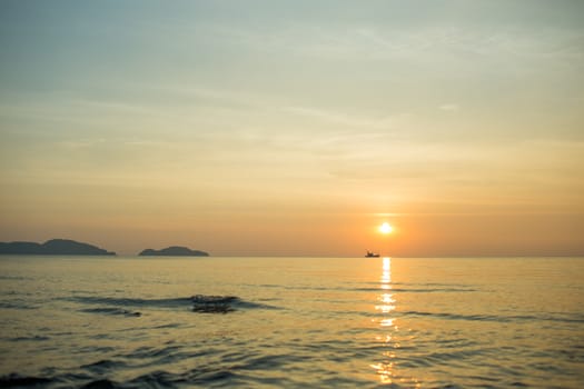 The lonely boat in the sea.