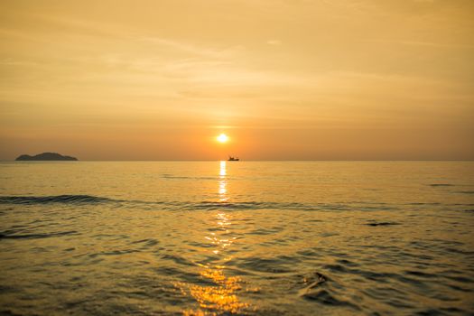 The lonely boat in the sea.