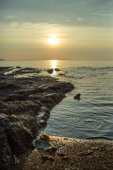 Blue sky and sun in the sea.