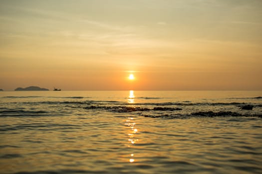 The lonely boat in the sea.