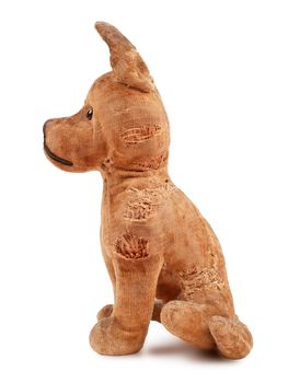 vintage toy dog, stuffed with straw, side view, isolated on white background