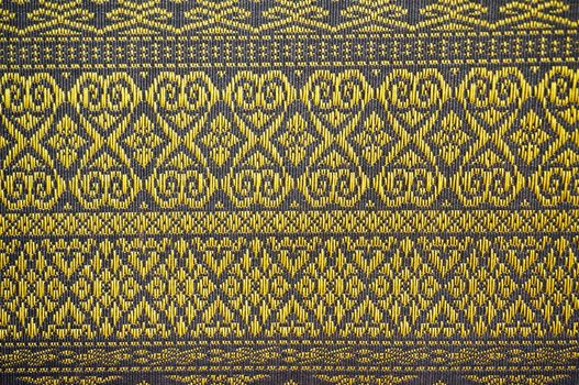 Fabric from Laos, a simple pattern is holizontal line and there are no flashy colors.                                