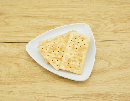 The biscuits have square shaped, good sized,
placed in a white plate.                             