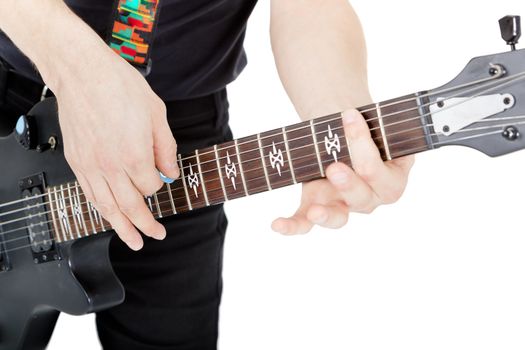 Man with a guitar on a white background. Performer with an electric guitar