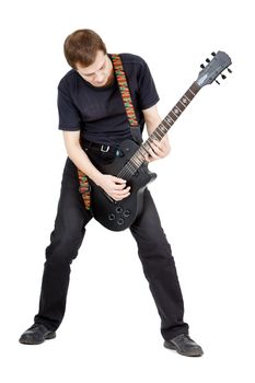 Man with a guitar on a white background. Performer with an electric guitar