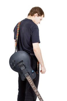 Man with a guitar on a white background. Performer with an electric guitar