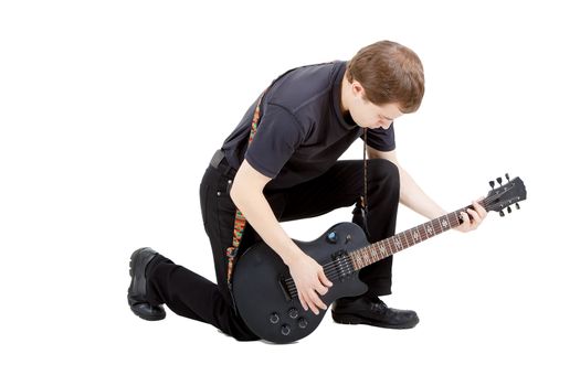 Man with a guitar on a white background. Performer with an electric guitar