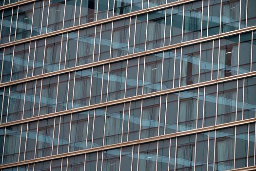 blue glass window that used many in modern building