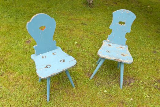 Two old Chairs on Grass