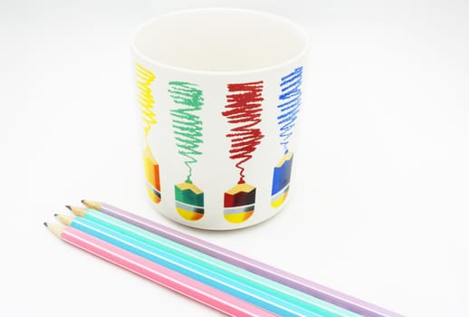 Pencil marking a straight line have been used already, blunt pencil, put four sticks. and beside has a cup with design of pencil picture.                               