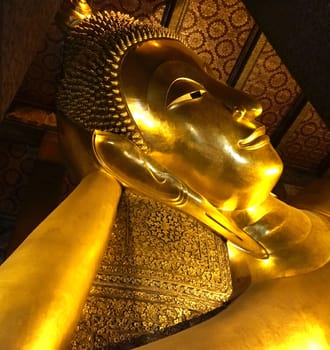 Reclining Buddha at Wat Pho An architecture that expresses the Buddhist faith.Located in Thailand.