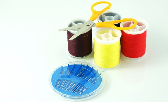 The sewing kit consists of sewing thread, needle and scissors.                                   