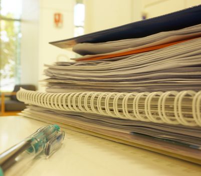 The documents and information in the office on the desk in the office.                              