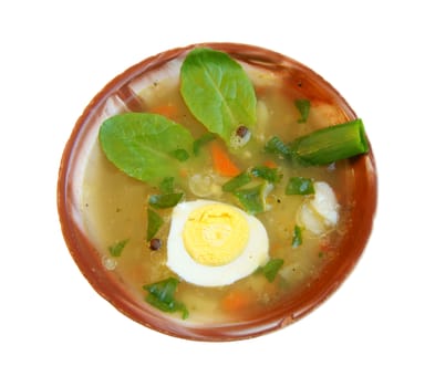 Plate with hot soup on white background is insulated